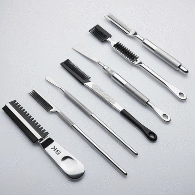Various clean and sanitized grooming tools laid out on a sterile surface, bright professional studio lighting